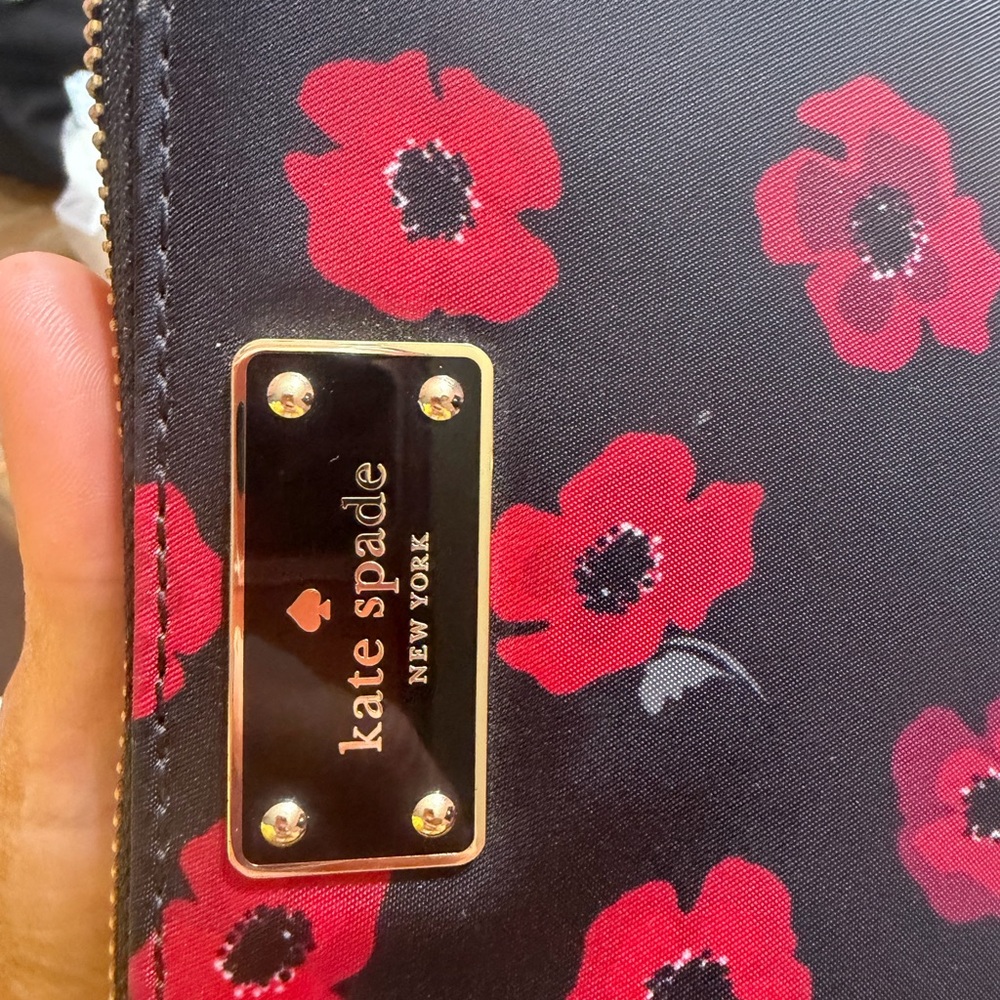kate spade Black Wristlet with Red Floral Print and Gold Plaque